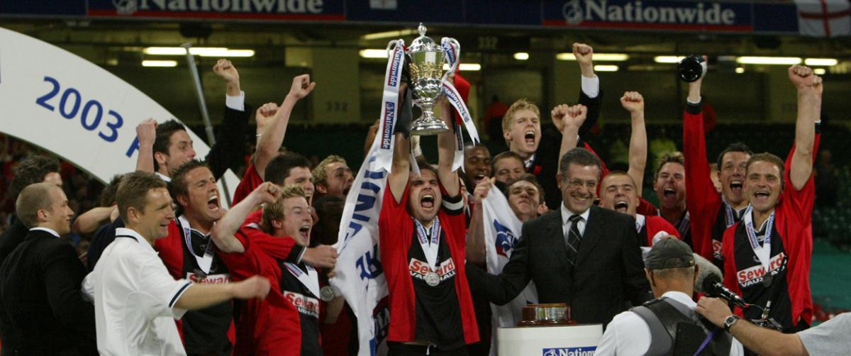 Players celebrate after receiving the trophy after winning the Division 3 playoff.  AFC Bournemouth v Lincoln City at Cardiff's Millennium Stadium, May 2003.   A selection of the images that are featured in the Daily Echo, AFC Bournemouth Photographic Boo