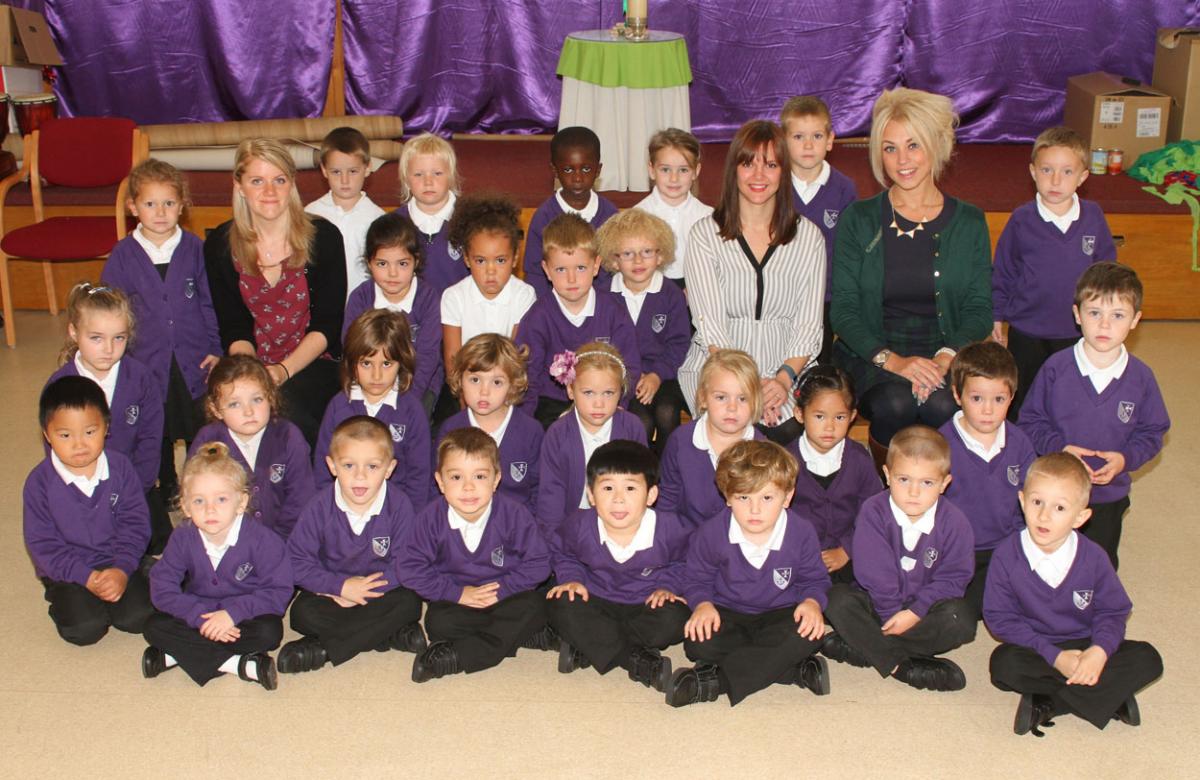 Octopus class at St Clement's and St John's Infants  School with teacher Miss Remy Richards, right, TAs Miss Louise Mundy, left, and Mrs Georgina Minton.