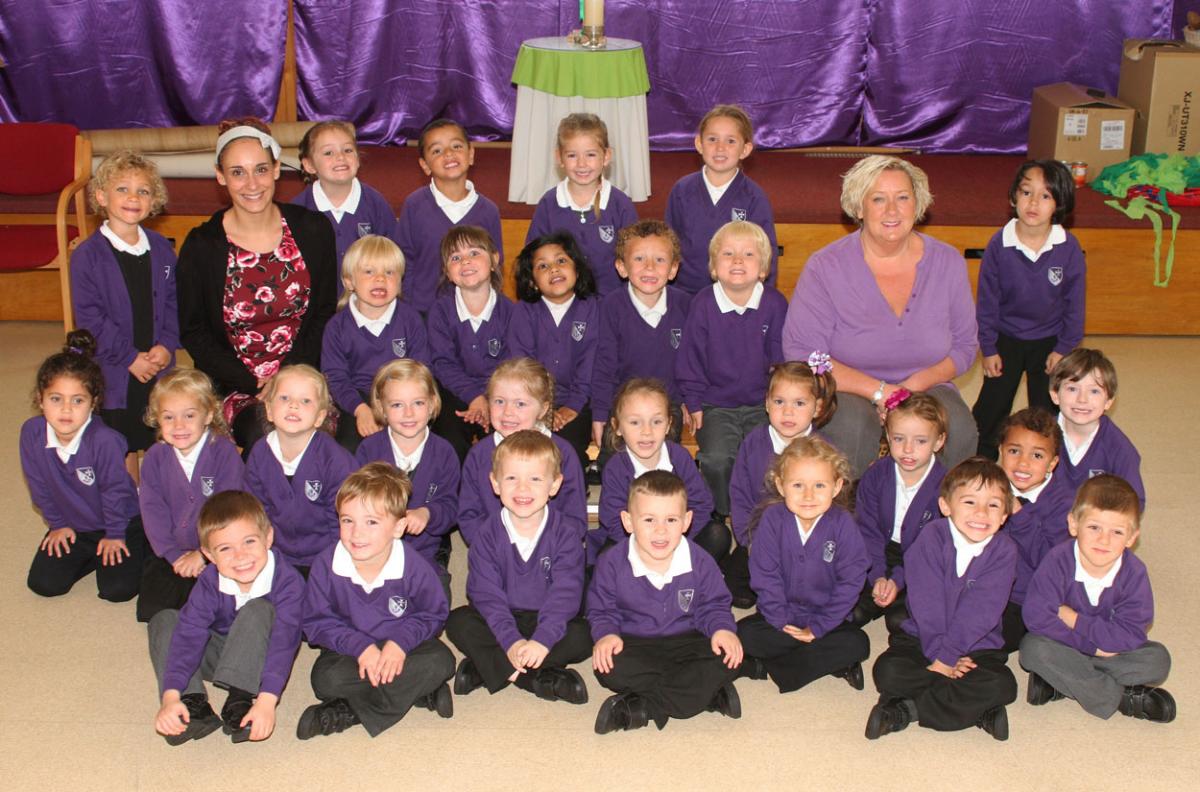Turtle Class at  St Clement's and St John's Infant School with teacher Miss Amy Meredith, left, and TA Mrs Julie Sawyer.    