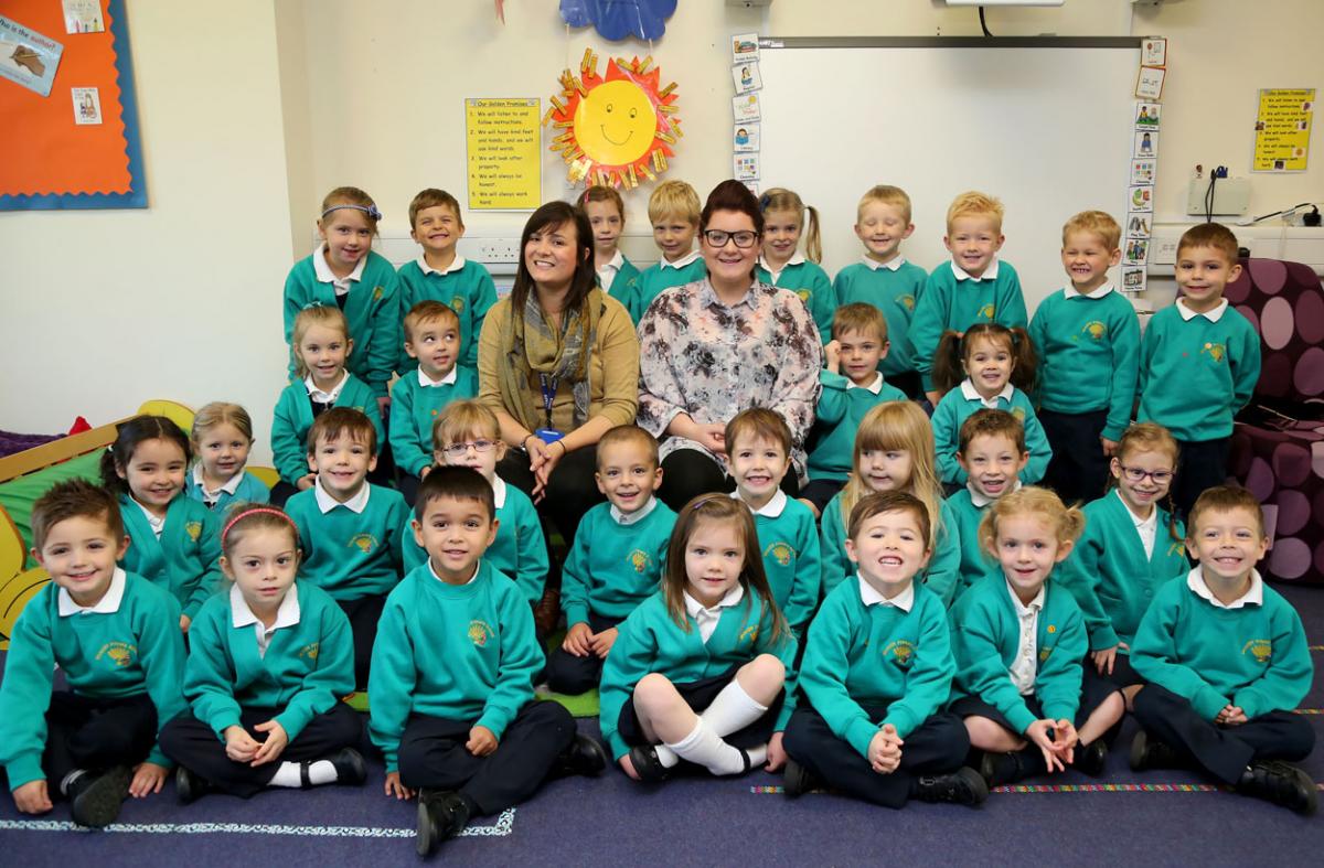 Rainbow Sun class at Muscliff Primary School, teacher, Mrs Hopewell and TA, Miss Henry.
