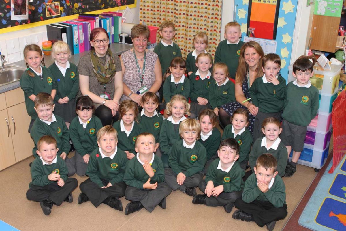 Otter class at Burton Church of England Primary School  with, l-r,  teacher Miss Sarah Colbourne and LSAs Mrs Alison Markwick and Miss Lisa Tanner.