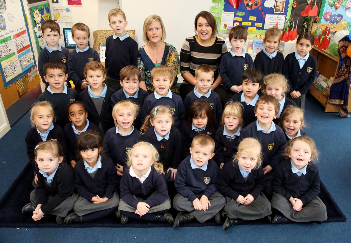 Reception class pupils at St Joseph's Catholic Primary  School with TA Victoria Price and teacher Emma Saunders. 
