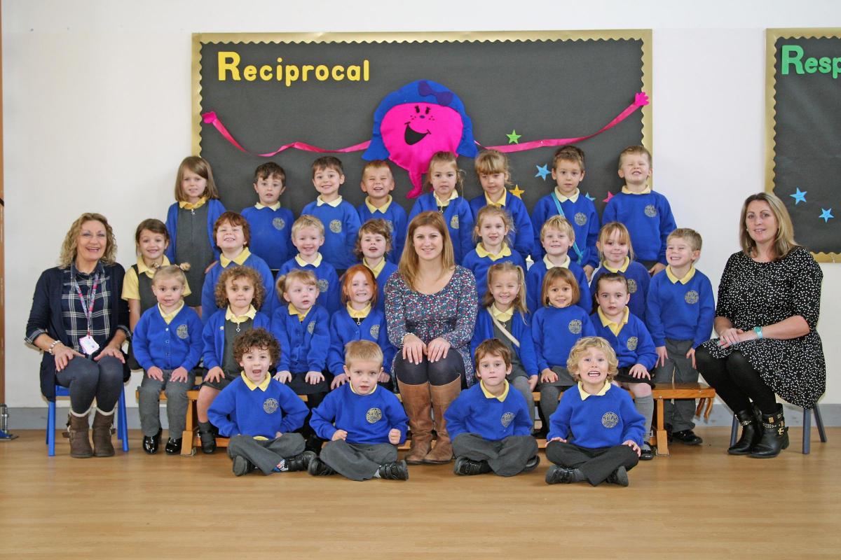 Seahorse class at Twin Sails Infants School with teacher Sarah Burge, centre, TA Lou Thompson, right and TA Heather Randall, left.