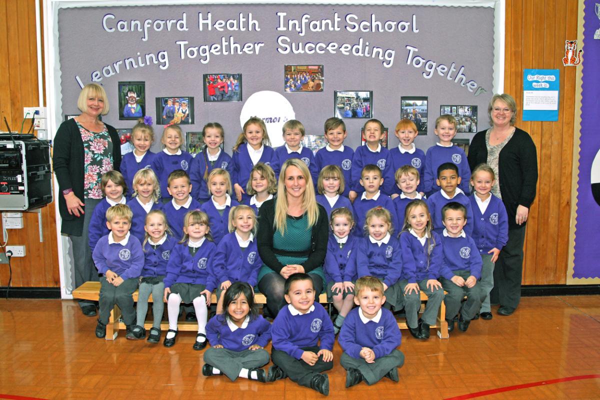 Ladybirds class at Canford Heath Infants School with teacher Laurin Palmer, centre, TA Debbie Mott, right and TA Claire Young, left.