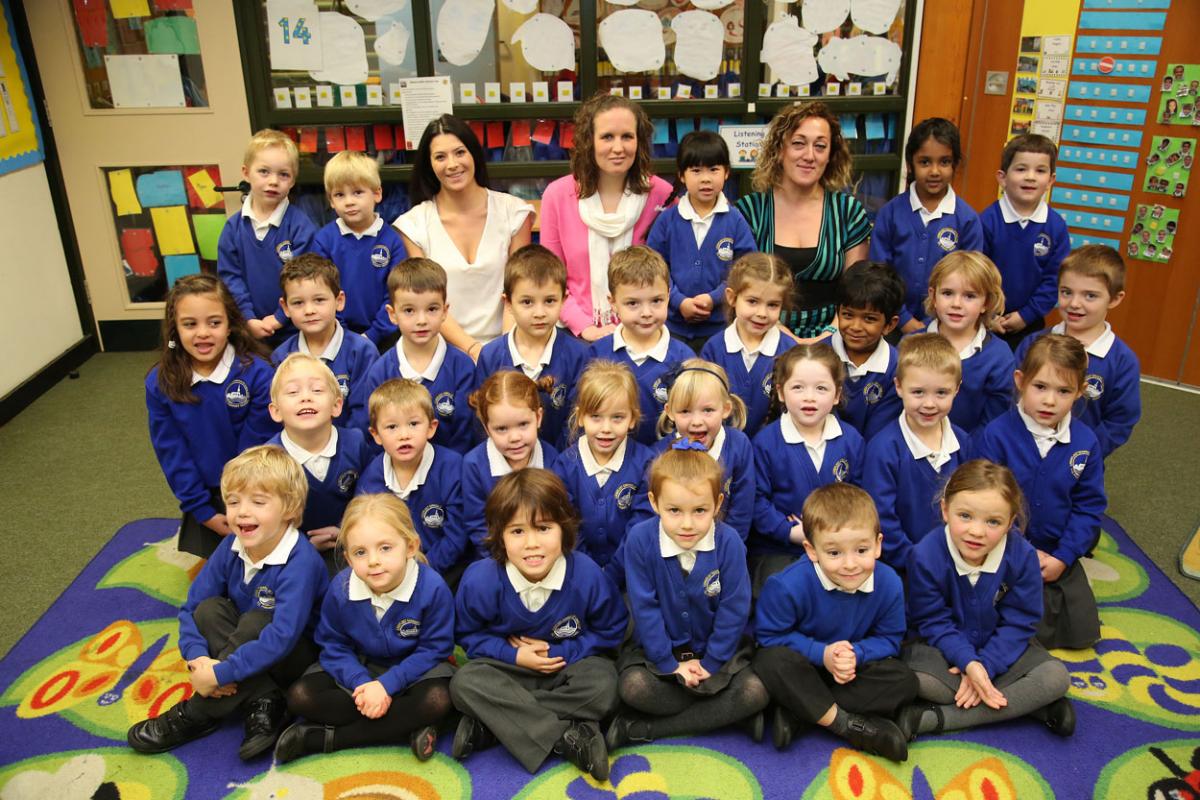 Reception class pupils at Longfleet Primary School with TA Helen Moore, teacher Emma Ramshaw and TA Becky Whitehead. 
