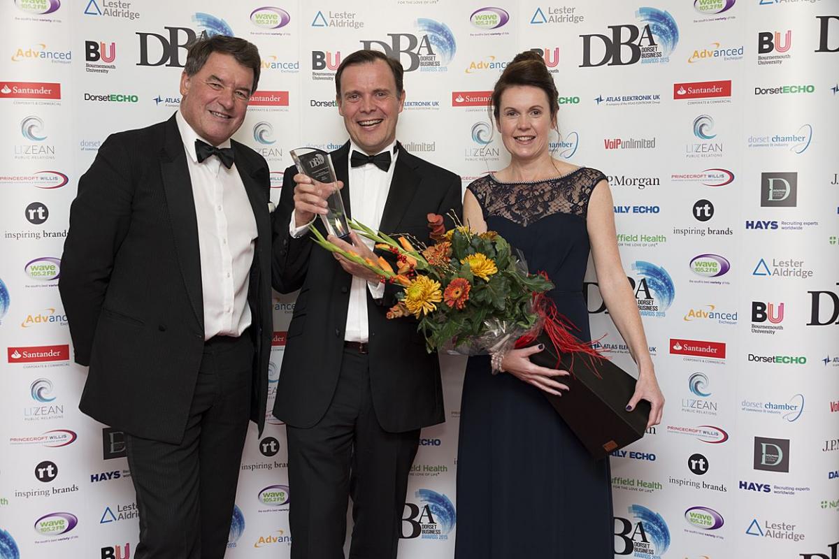 Trelawney Dampney of Eco Sustainable Solutions, who presented the award, with winner Phil Whitehurst of Actisense and Michelle Whitehurst