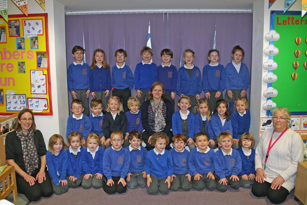 Reception class at Shaftesbury Abbey Primary School with teacher Vicki Green, centre, TA Julie Isaacs, left and TA Pat Fry, right. 