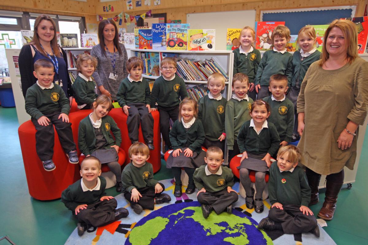 Reception class at St Mark's C.E. Primary School with teacher Lisa Cooper, right, TA Sophie Williams, second from left and Apprentice Kayleigh Gauntlett, far left.