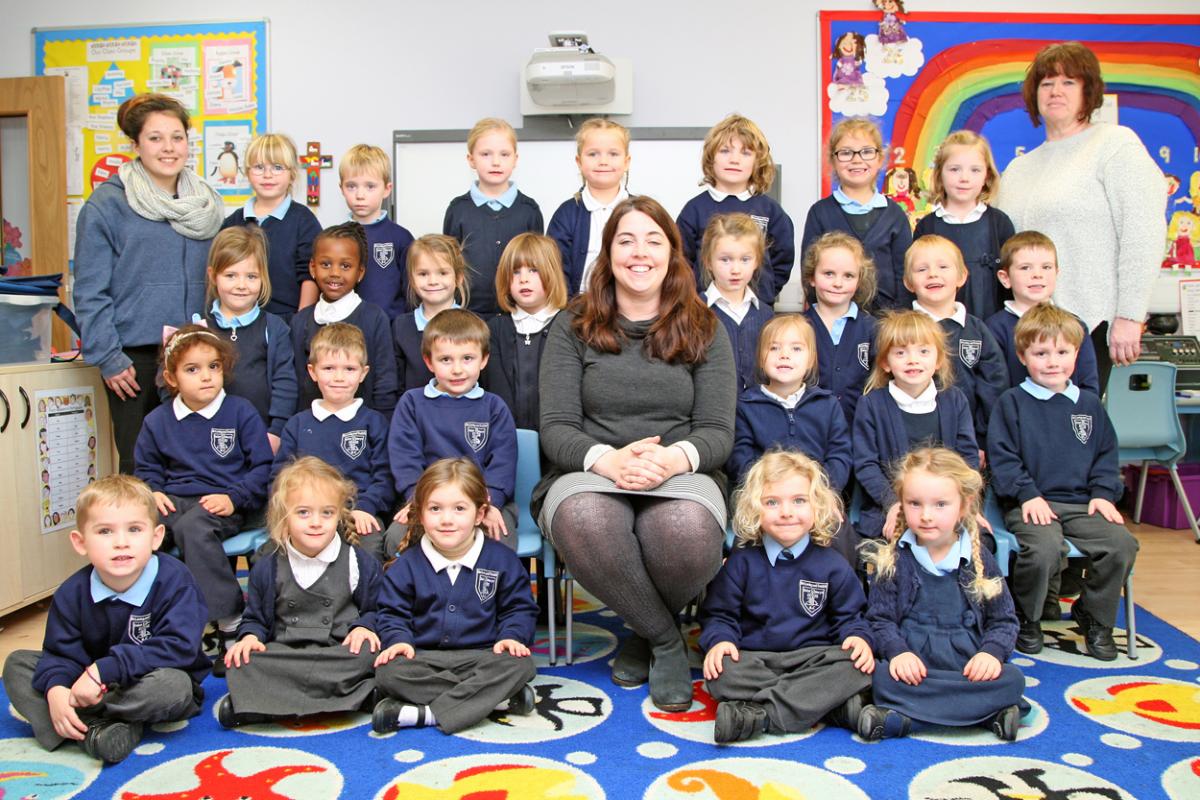 Reception class at St Mary's RC Primary School with teacher Louise Gray, centre, TA Tricha Kellaway, right and TA Lauren Pidgley, left.