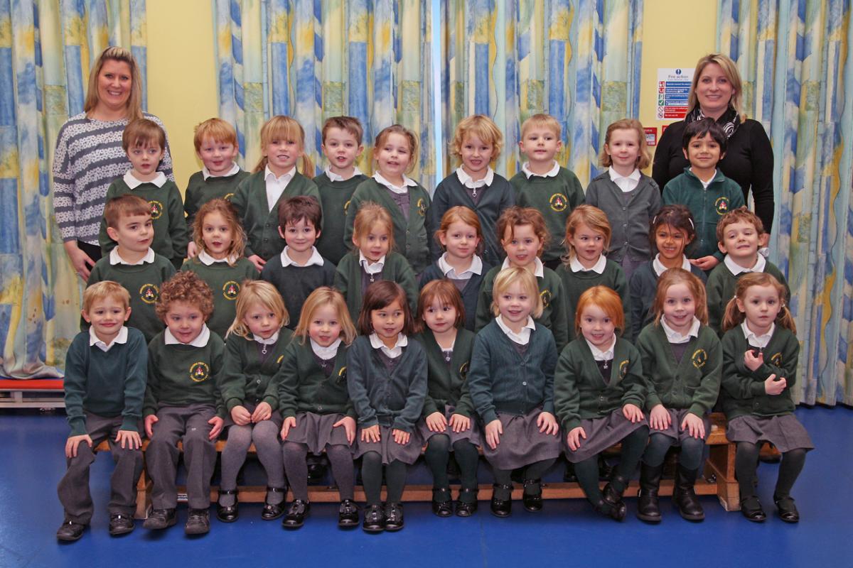 Mole class at Wimborne First School with teacher Amy Pilley, left and TA Marie Whetlor, right