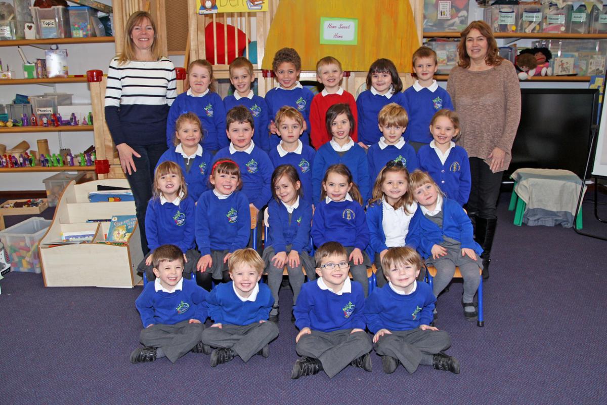 Lions class at Bransgore Primary School with teacher Sam White, left and TA Debbie Welch, right.