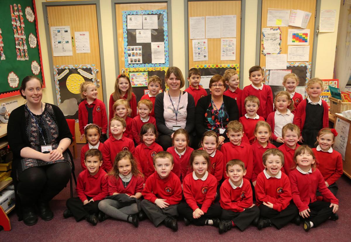 First Class at Archbishop Wake Primary School. TA Mrs Disbrow, teacher, Mrs Darley and TA Mrs Bagg.