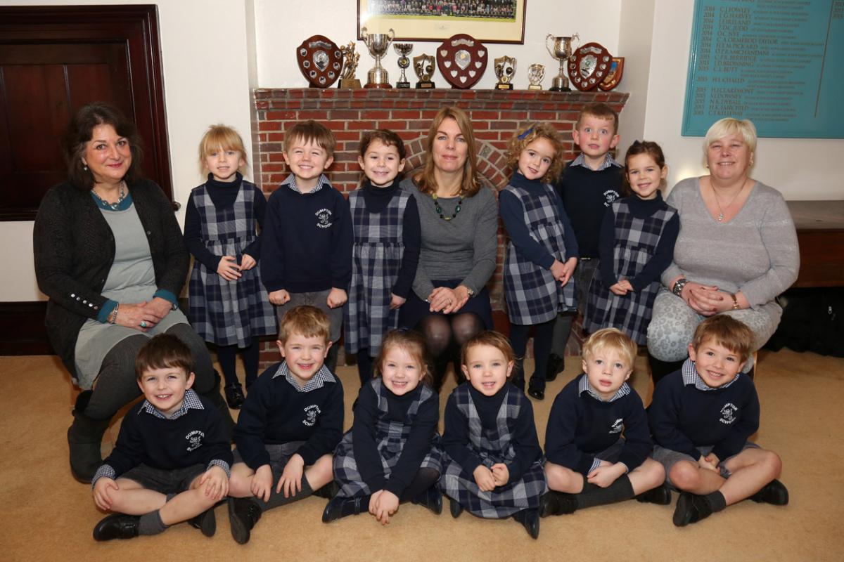 Reception children at Dumpton School in Wimborne with teacher Sharon Morton, centre, and TA's Mary McMillen, left, and Clare Goulding.