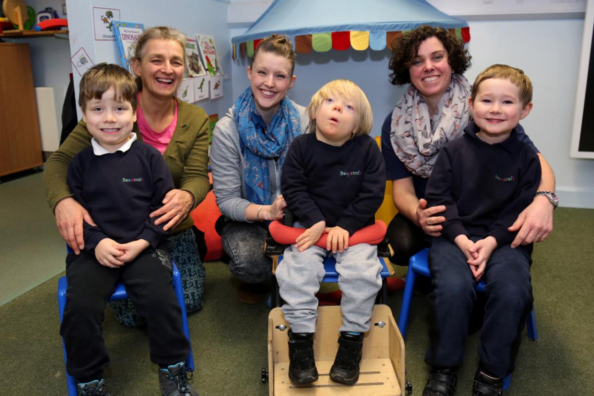 Reception children at Beaucroft Foundation School in Colehill with teacher Laura Jones, centre, and TA's Geal Stanfield, left, and Karen Evans.