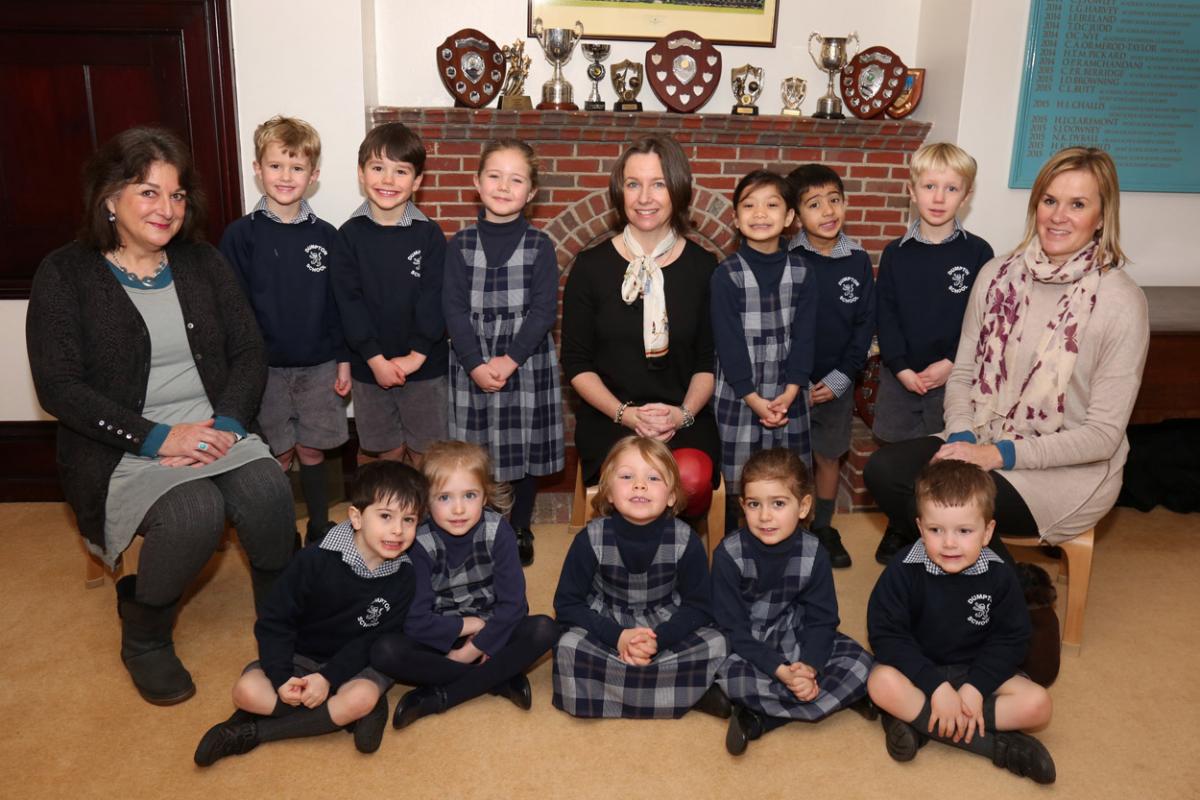 Reception children at Dumpton School in Wimborne with teacher Tonya Monaghan, centre, and TA's Mary McMillen, left, and Boo Wartnaby.