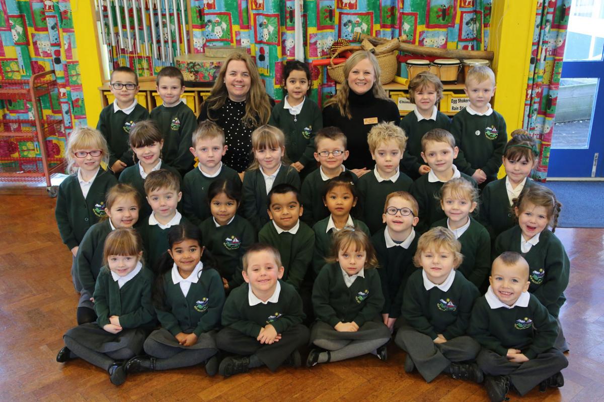 Reception class pupils at New Milton Infants School with TA Tracey Press and teacher Lou Tett. 