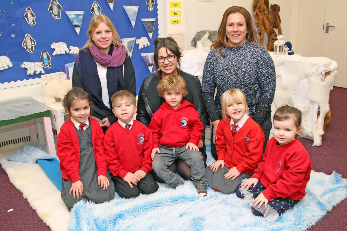 eception and Foundation classes at St Mary's Catholic Primary School with Reception teacher Hilly Webb, centre, TA Amber Gould, left and Pre-School leader Lisa Howard, right.