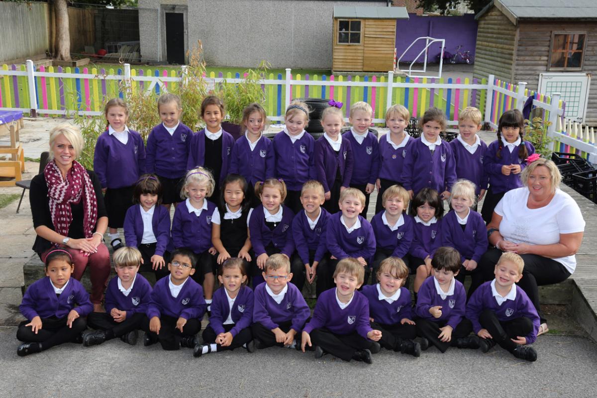 Reception children in Octopus class at  St Clement's and St John's Infant School in Bournemouth with teacher Remy Richards and TA Julie Sawyer.