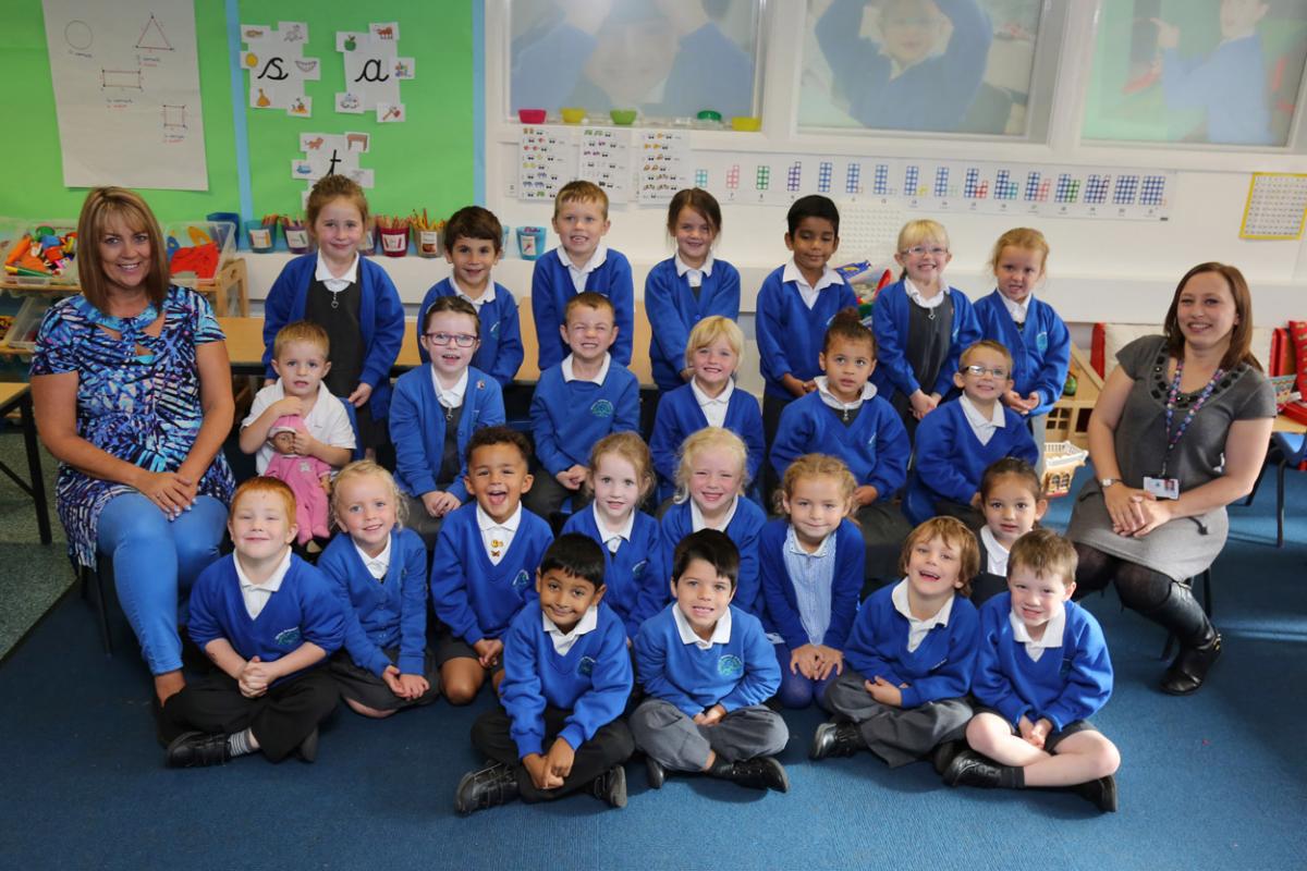 Reception children in Pear Class at Winton Primary School in Bournemouth with teacher Kayley Browne, right, and TA Debbie Jackson.