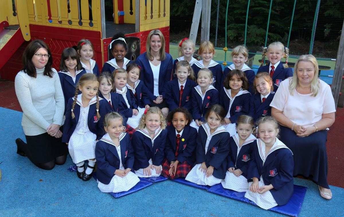 Reception children at  Talbot Heath School in Bournemouth with Amanda Pidgley, centre, and TA's  Veronica Rose and Nicola French