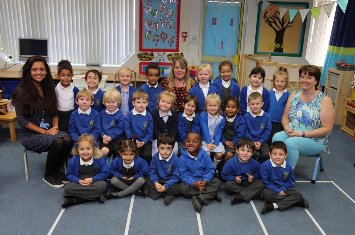 Reception children at  St Michael's primary school in Bournemouth with teacher Sarah Maidment, centre, and TA's  Pierina White and Carol Murawski