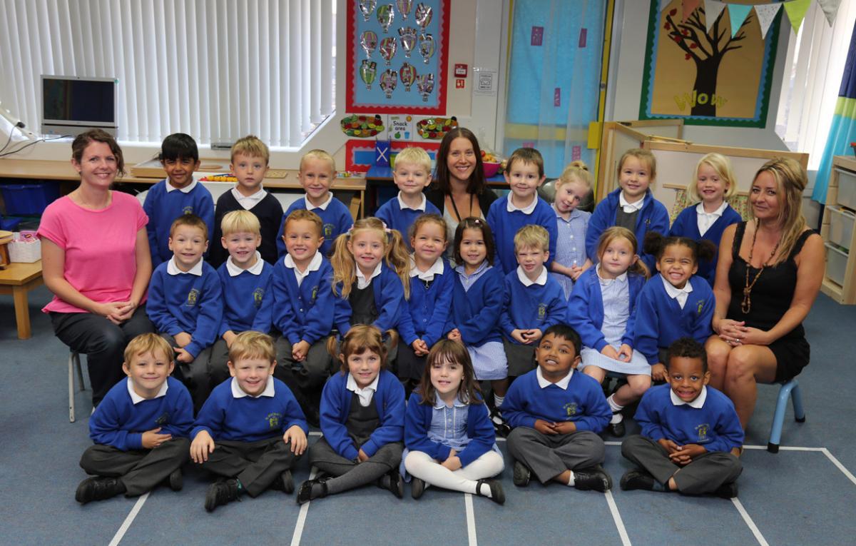 Reception children at  St Michael's primary school in Bournemouth with teacher Nicola Jess, centre, and TA's Dani Haigh and Tracie Manley.