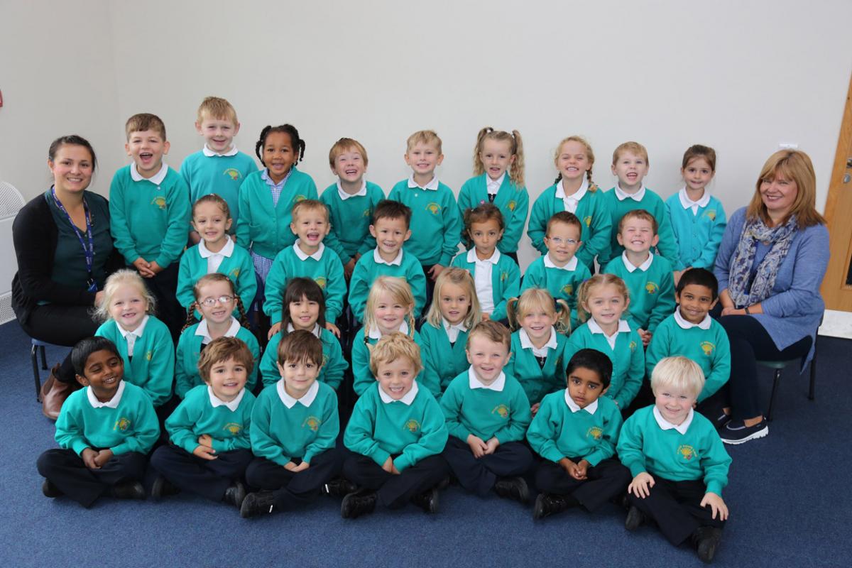 Reception children in Rainbow Sun class at Muscliff Primary School in Bournemouth with teacher Bethany Hopewell and TA Sally Toms.