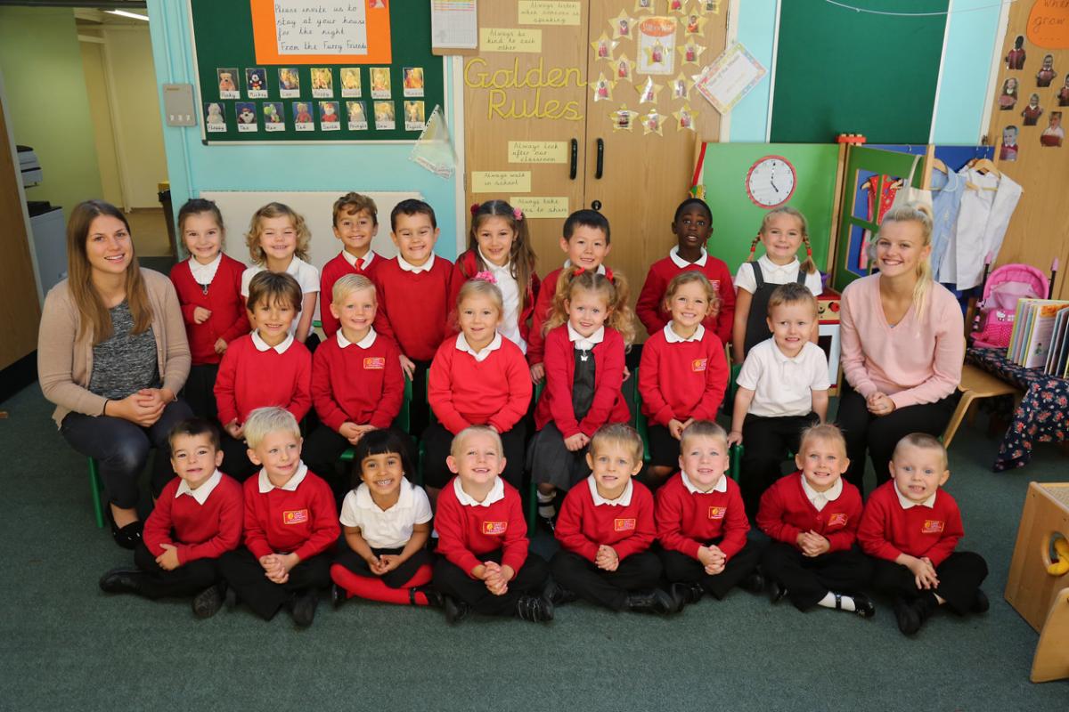 Reception children at Elm Academy in Kinson with teacher Anna Gibson and TA Charlie Hall.