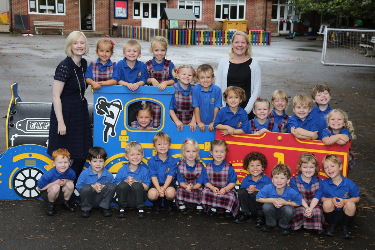 Reception children at St Thomas Garnet's school with teacher Laura Sansom, right, and  TA Hilary Bromage.