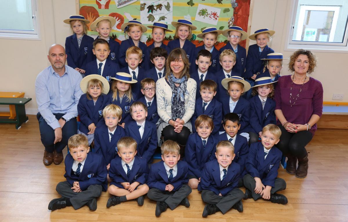 Reception children at  Twynham Primary School with  teacher Miranda Long, centre, and TA's Wayne Davies and Fay Langford.