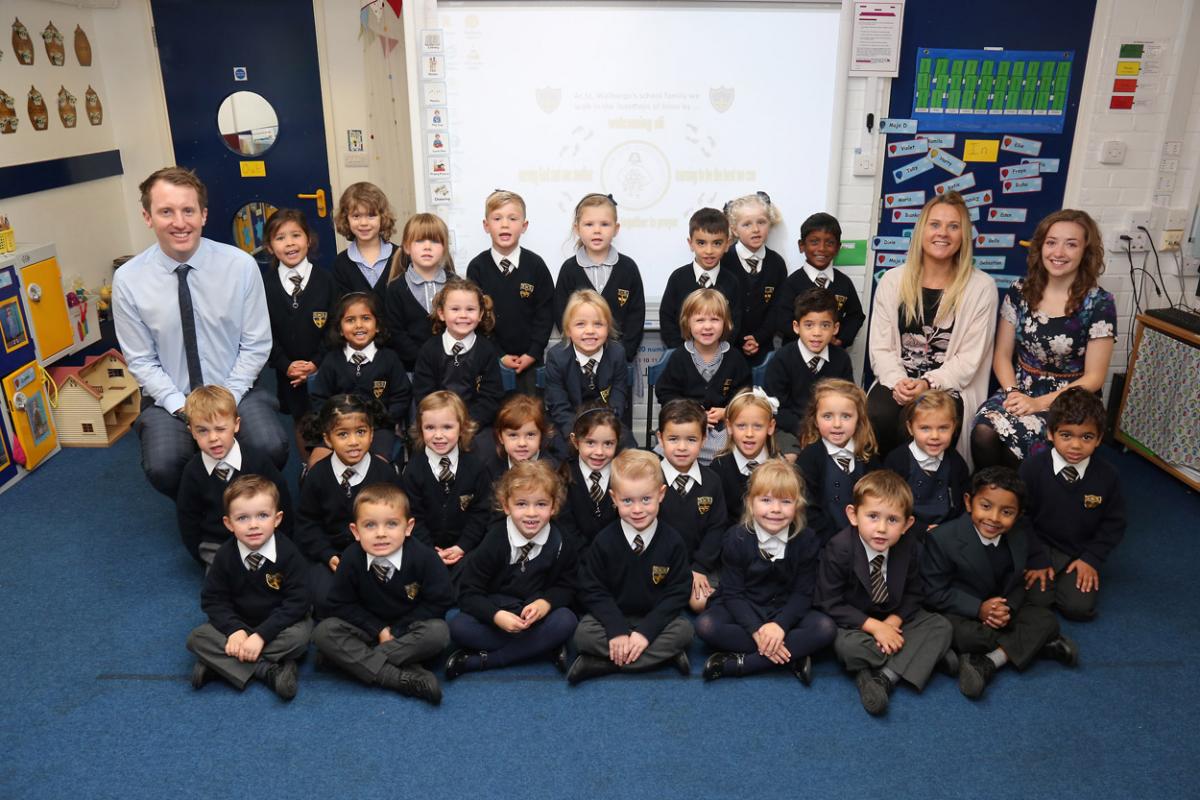 Reception children at St Walburga's Catholic Primary School with teacher Matthew Lawrence and TA's Helen Robbins and Jessica Sidwick.