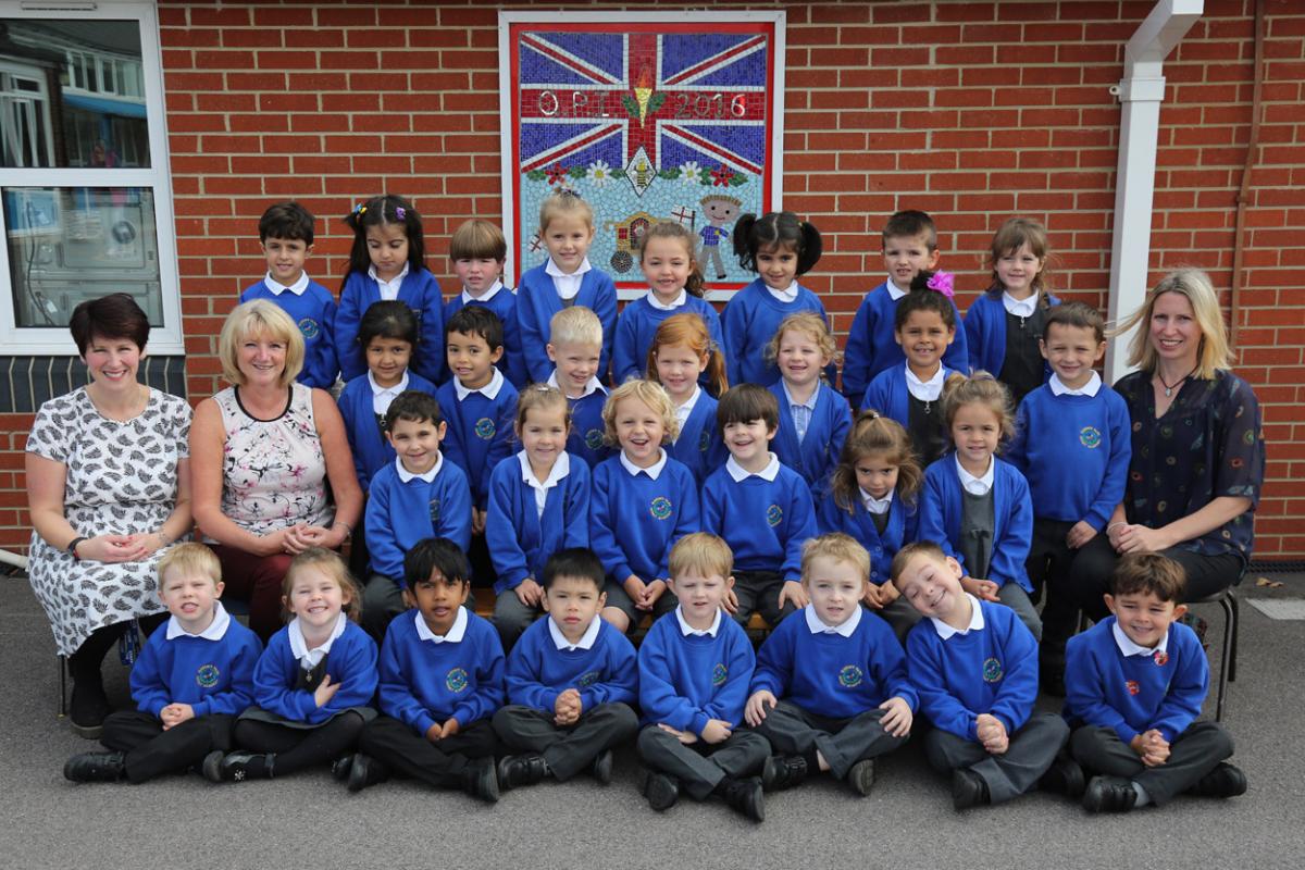 Reception children in Robins class at Queen's Park Infant Academy with teacher Rachael Hodson, right, and TA's Ami Donoghue and Wendy Druce.