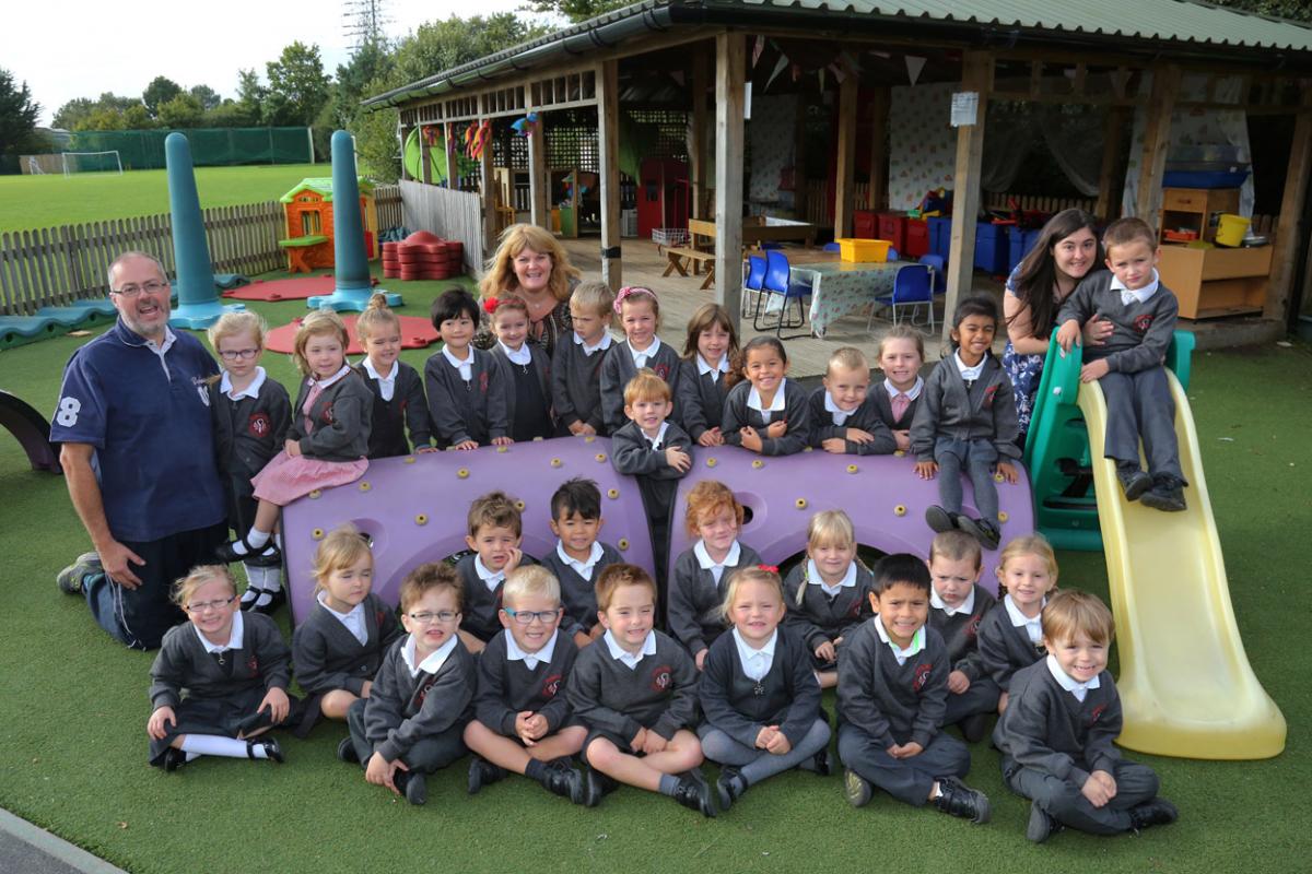 Reception children at  Bishop Aldhelm's  C.E  V.A. Primary School with  teacher Richard Sharp and TA's Sarah Martin and Sophie Laing.