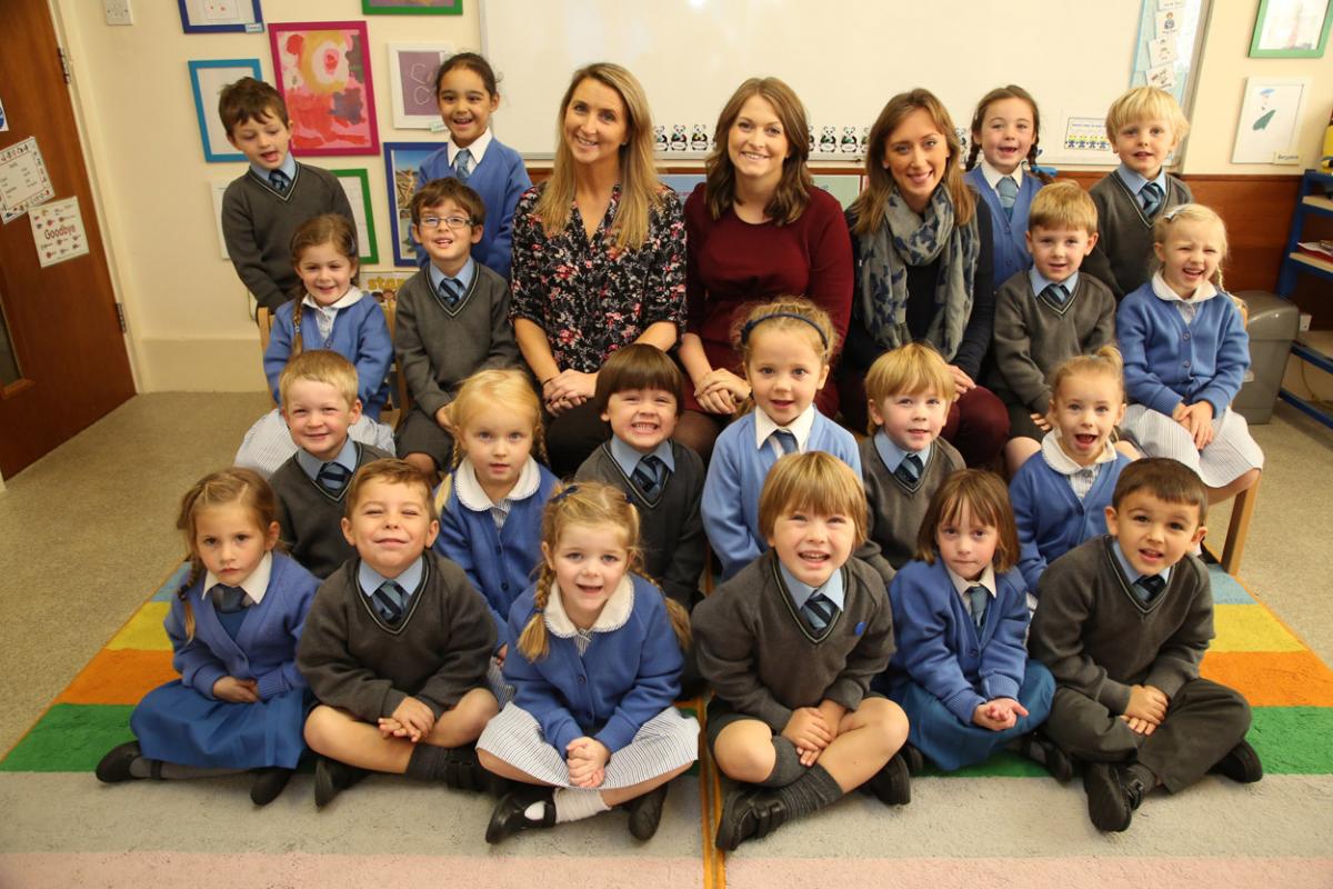 Reception children at Park School in Bournemouth with staff, TA Lyndsay Hewitt, teacher Hannah Beach and TA Lisa Carey