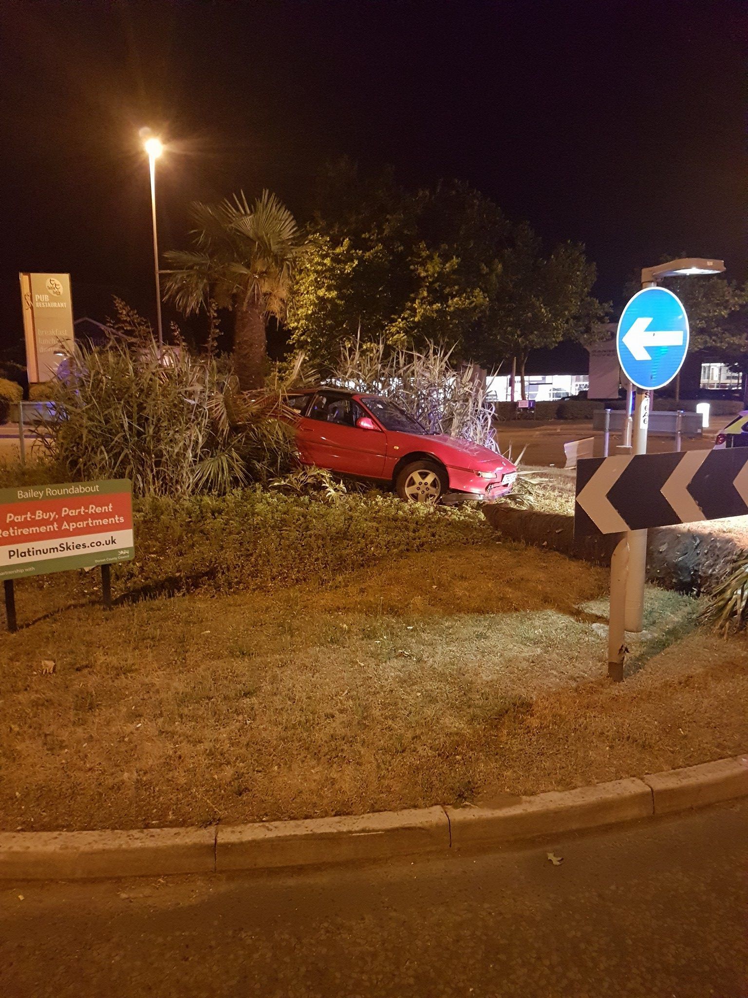 Driver arrested after car crashes through the middle of roundabout - Bournemouth Echo