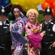 Pic Hattie Miles - Bourne Free Pride march from Allum Chine to Bournemouth gardens - Men in uniform ... special  constables Darren Brook, left, and Darren Ferguson with Lady James, centre left, and Sally Vate!!
