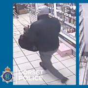 A man with a metal bar threatened a staff member and demanded money from the safe at the Central Store in Heddington Drive.