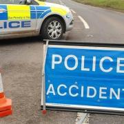 Lengthy delays after crash near busy roundabout