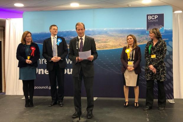 Graham Farrant, Acting Returning Officer and BCP Council Chief Executive announces Michael Tomlinson as winner of Mid Dorset and North Poole at the BIC on December 13, 2019, during the 2019 general election. Picture by BCP Council.