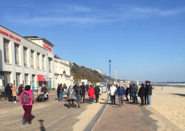 Bournemouth Echo: People on beach in Bournemouth before lockdown one in 2020
