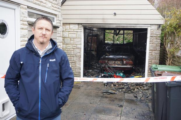 Bournemouth Echo: Jonathan Rayner’s 1972 Triumph TR6 was torched in the garage fire. He has owned the car, inset, for several years