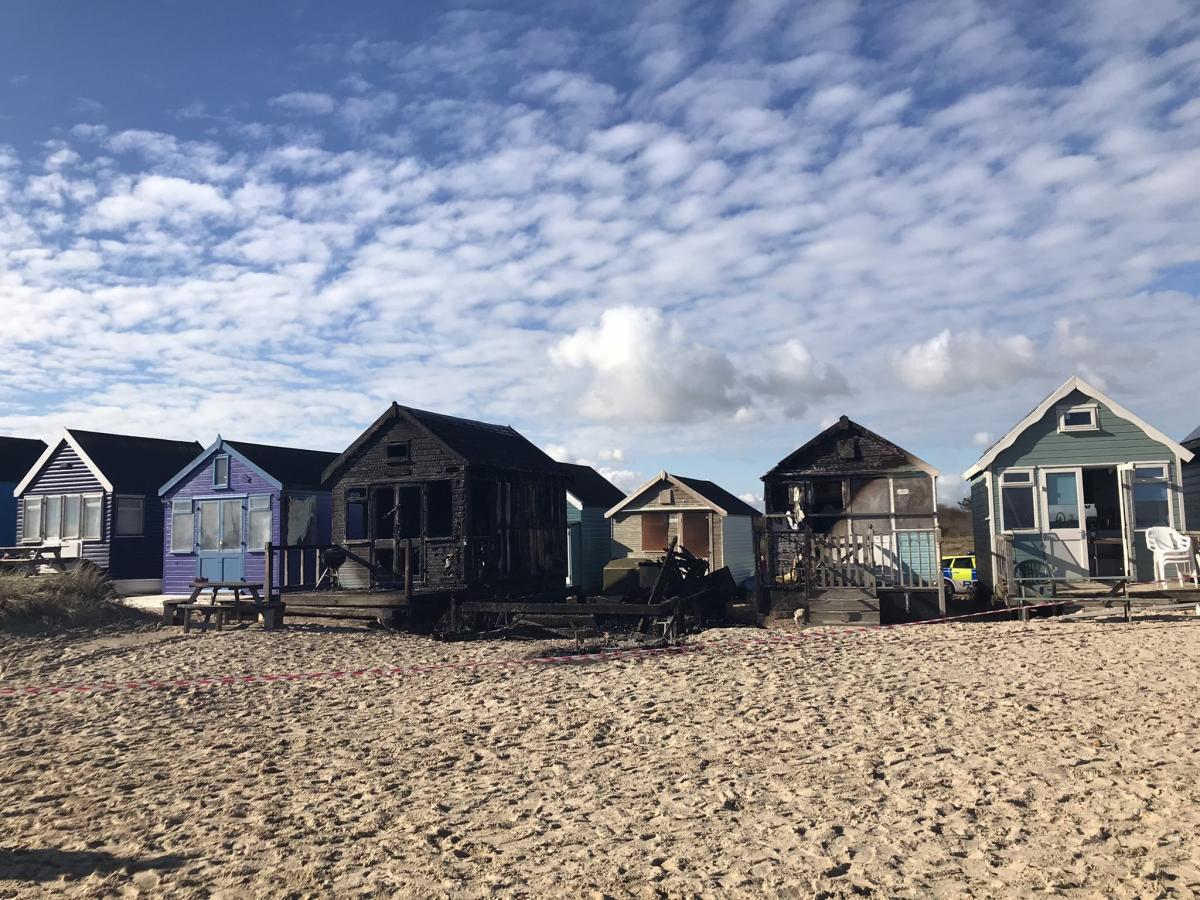 The damaged beach huts