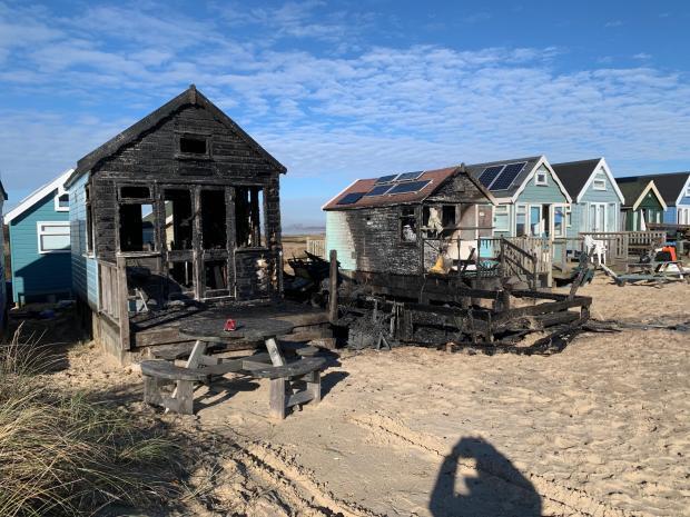 The damaged beach huts.Photo by Stephen Bath 