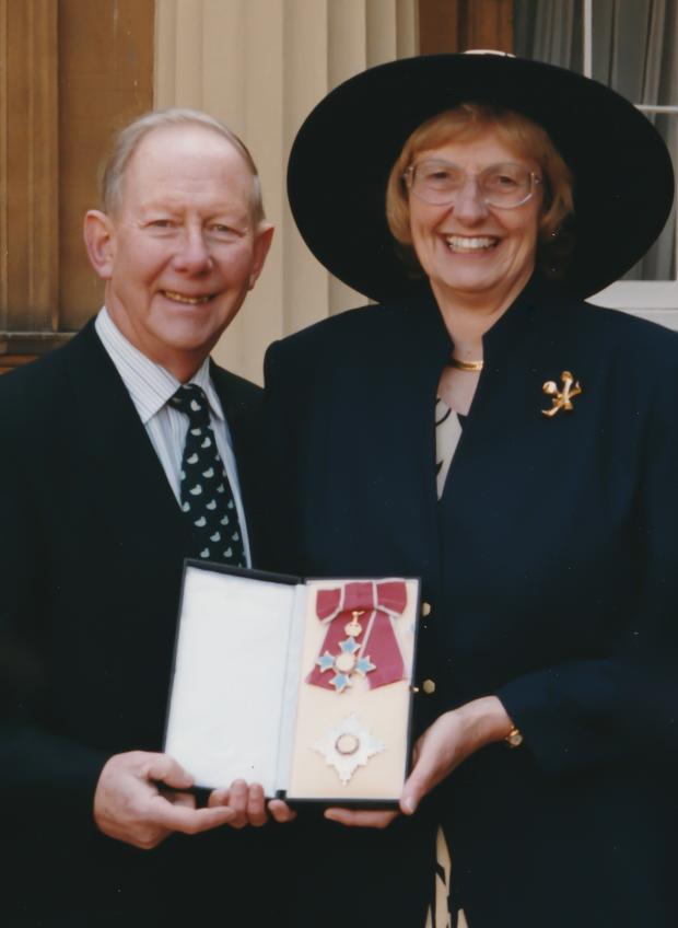 Bournemouth Echo: Dame Margaret and her husband Gordon at Buckingham Palace