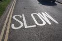 BCP Council have painted slow signs on Chichester Way on the approach to Mudeford Quay, 18 months after a resident painted his road markings scrubbed on the road