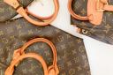 The woman was selling fake Louis Vuitton goods