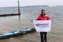 World record paddleboarder completes 24-hour challenge on Poole Harbour