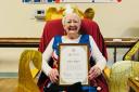 Eileen Waters with her award certificate at Blandford Hospital