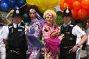 Pic Hattie Miles - Bourne Free Pride march from Allum Chine to Bournemouth gardens - Men in uniform ... special  constables Darren Brook, left, and Darren Ferguson with Lady James, centre left, and Sally Vate!!