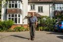Stephen Bailey outside his late parents' home in Sandbanks